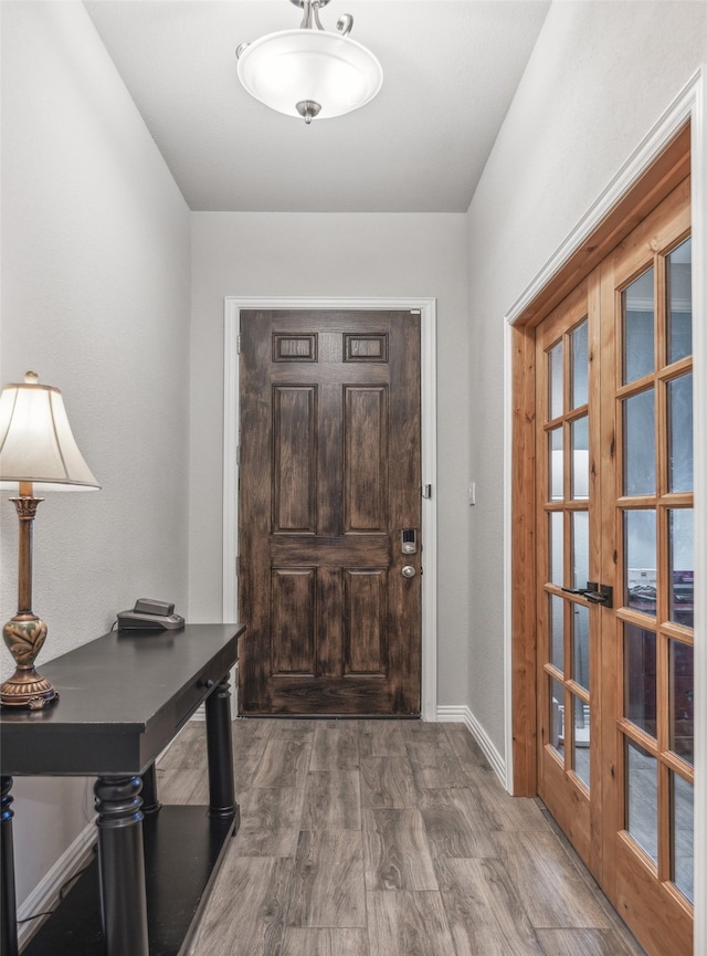 foyer entrance featuring french doors