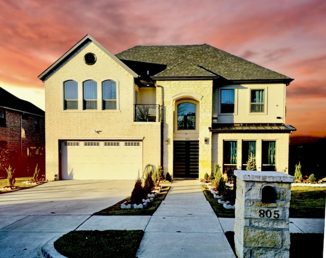 view of front of home with a garage