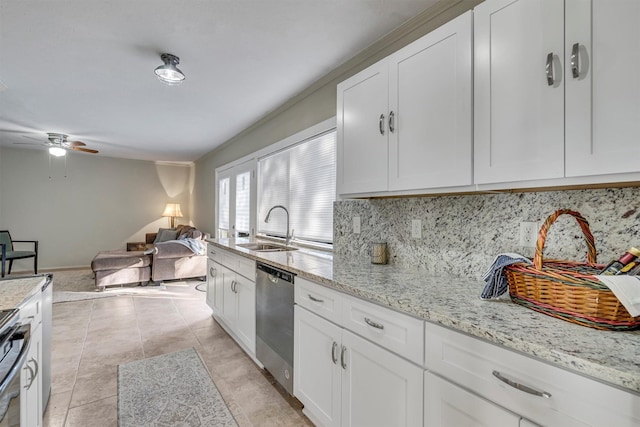 kitchen featuring white cabinetry, ceiling fan, decorative backsplash, dishwasher, and sink