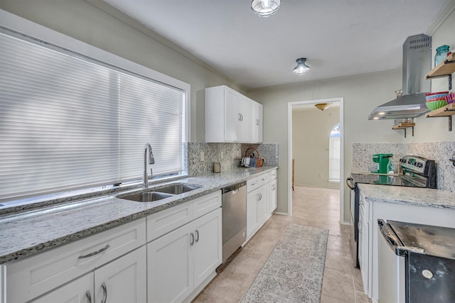 kitchen featuring white cabinetry, island range hood, stainless steel appliances, tasteful backsplash, and sink