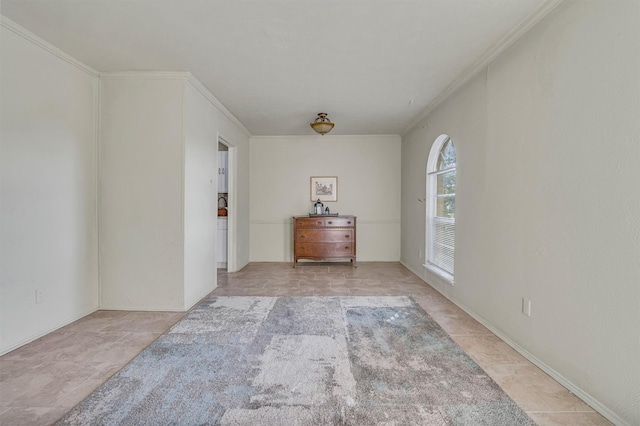 unfurnished room featuring crown molding