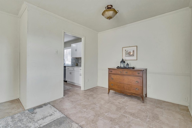 hallway featuring crown molding