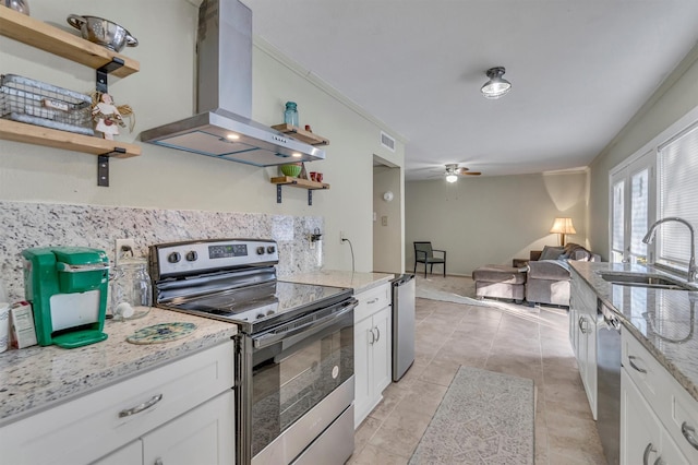 kitchen featuring sink, white cabinetry, appliances with stainless steel finishes, and island exhaust hood