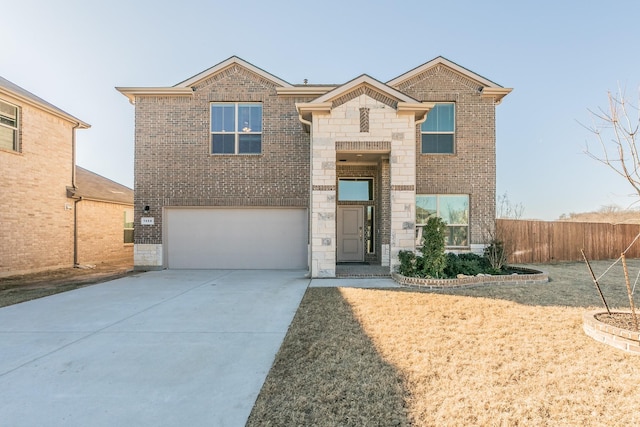 view of front of property with a garage