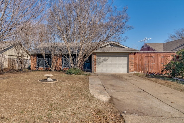 single story home featuring a garage