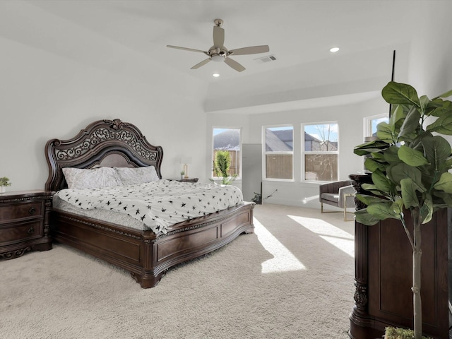 bedroom with ceiling fan and carpet floors