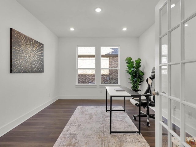 home office featuring french doors and dark wood-type flooring