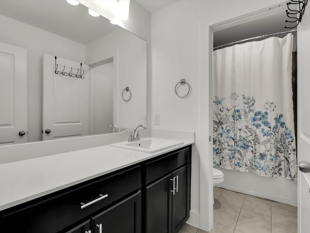 full bathroom with shower / tub combo, tile patterned flooring, vanity, and toilet