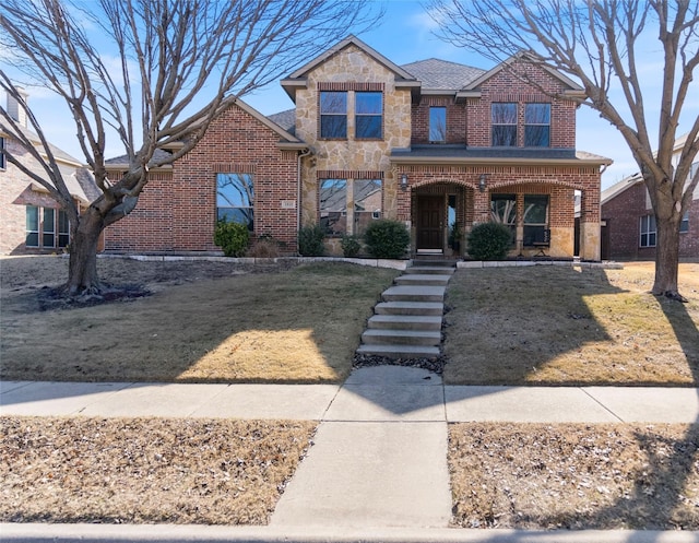 front facade with a front lawn and a porch