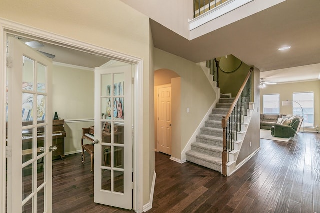 stairway with wood-type flooring