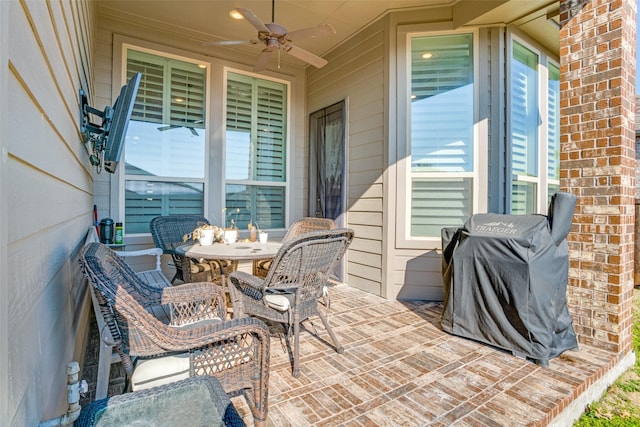 view of patio / terrace featuring ceiling fan