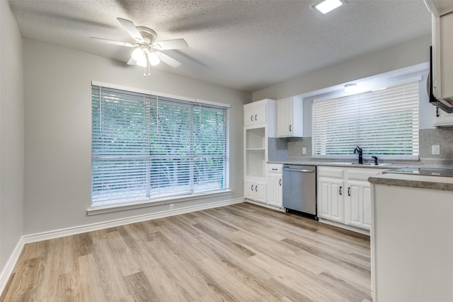 kitchen featuring a textured ceiling, white cabinetry, ceiling fan, tasteful backsplash, and stainless steel dishwasher