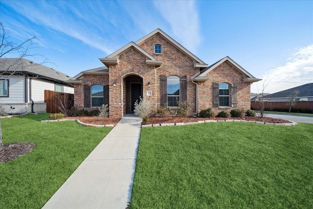 view of front of property with a front lawn