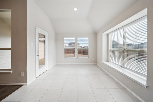 unfurnished sunroom with vaulted ceiling