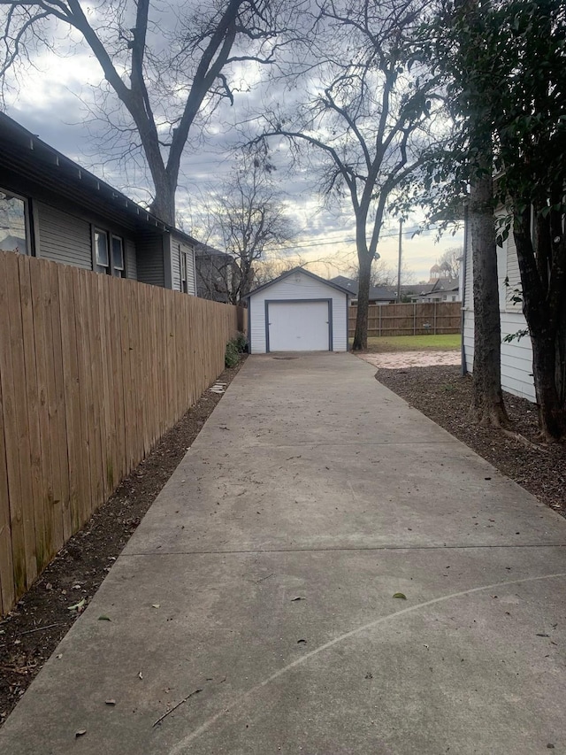 exterior space featuring an outdoor structure and a garage