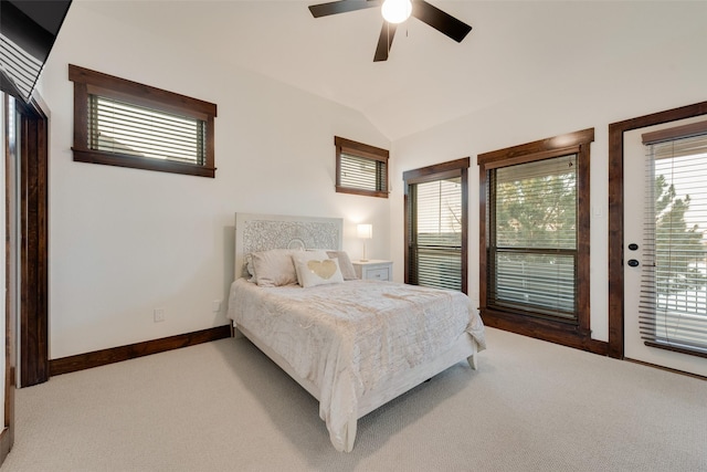 carpeted bedroom featuring access to exterior, ceiling fan, and lofted ceiling