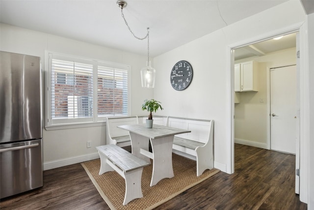 dining room featuring dark hardwood / wood-style flooring