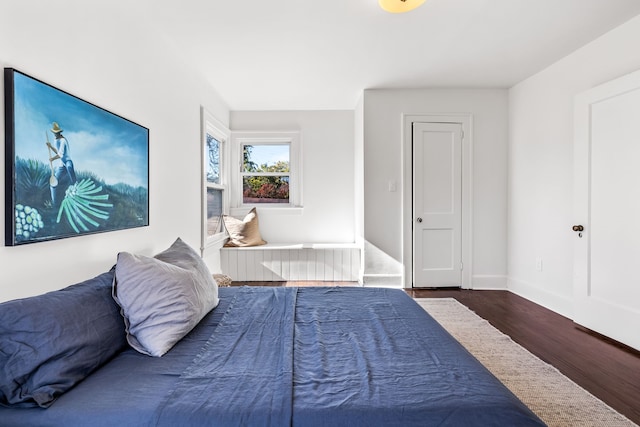 bedroom featuring dark hardwood / wood-style floors