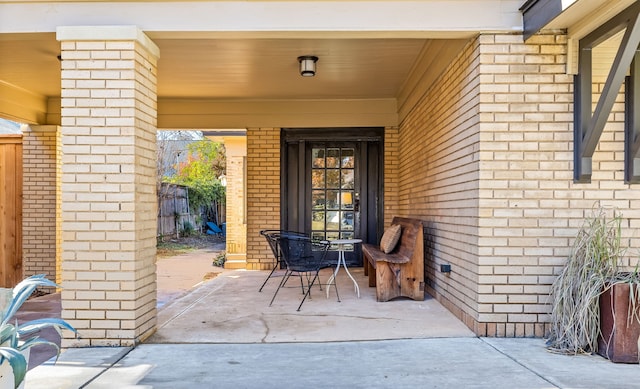 property entrance featuring a patio area