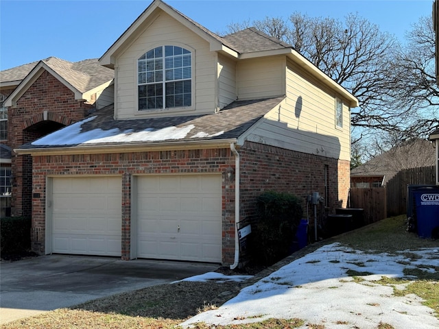 view of property exterior featuring a garage