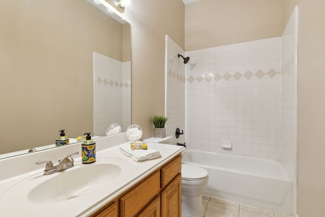 full bathroom with toilet, vanity, tiled shower / bath combo, and tile patterned flooring