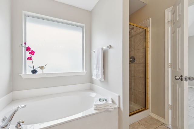 bathroom with plus walk in shower and tile patterned floors