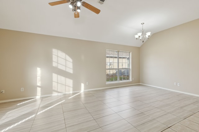 tiled empty room featuring ceiling fan with notable chandelier and vaulted ceiling