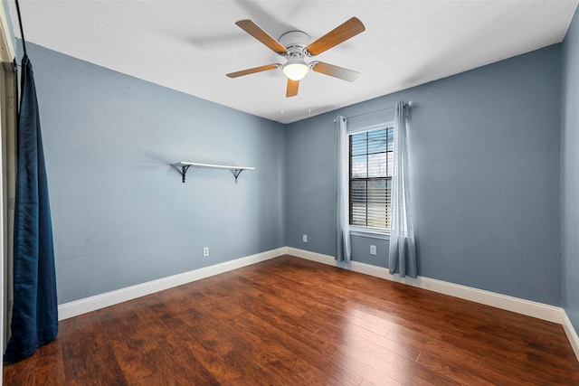 spare room with ceiling fan and hardwood / wood-style floors