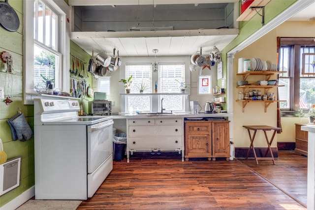 kitchen with white range with electric cooktop, dark wood-type flooring, and sink