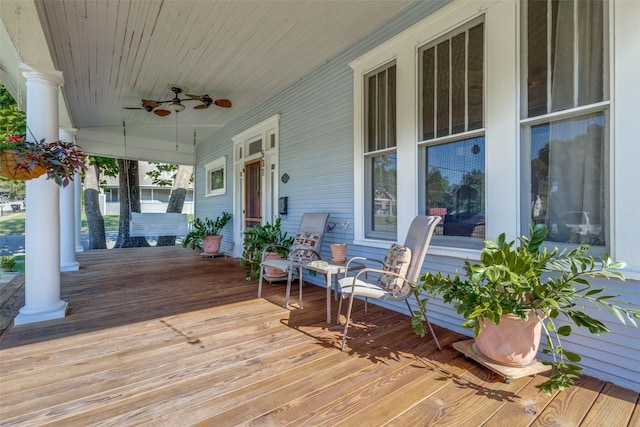 wooden deck with ceiling fan