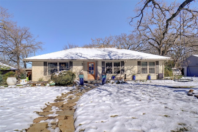 view of snow covered property