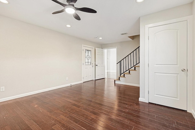 interior space featuring ceiling fan and dark wood-type flooring