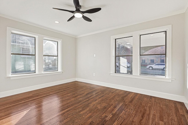 unfurnished room with dark hardwood / wood-style flooring, ceiling fan, and ornamental molding