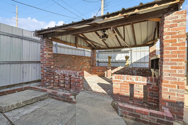 view of patio featuring a gazebo and ceiling fan