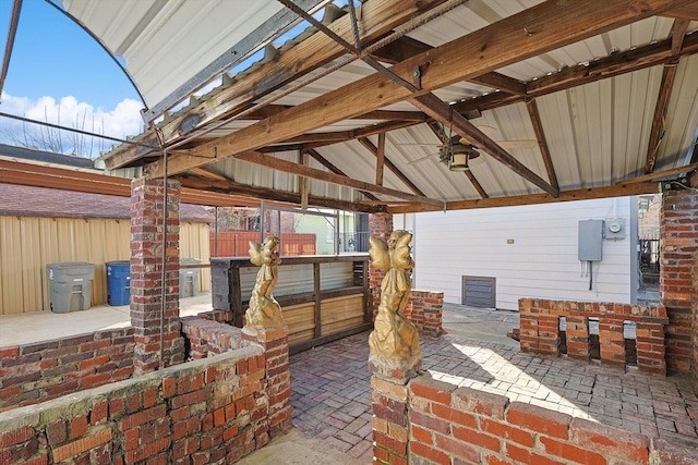 view of patio with an outbuilding