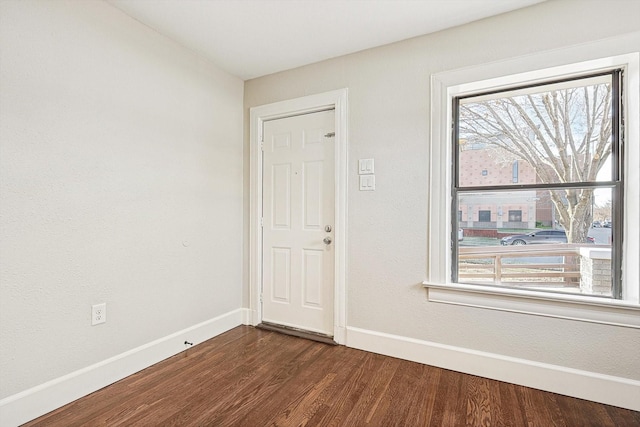 interior space with dark hardwood / wood-style flooring