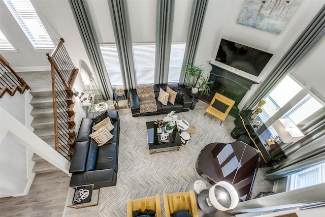 living room with wood-type flooring and a wealth of natural light