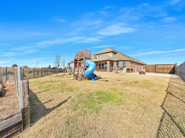 view of yard with a playground