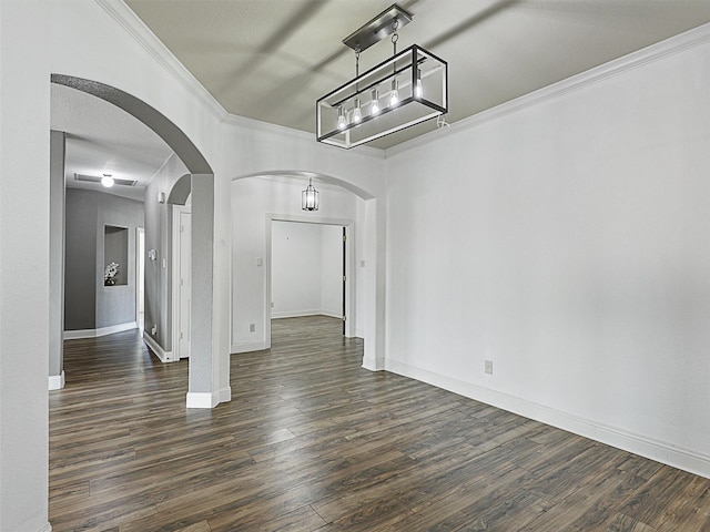 unfurnished dining area with dark wood-type flooring and crown molding