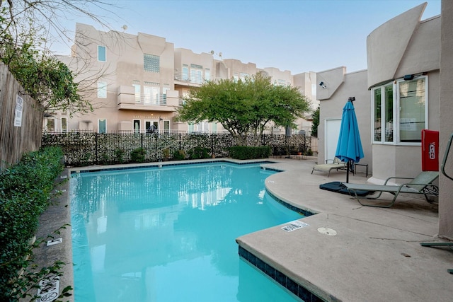 view of pool featuring a patio