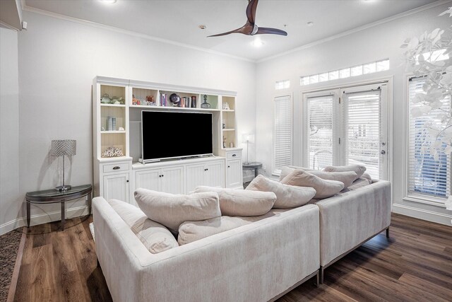 living room with dark hardwood / wood-style flooring, ceiling fan, and ornamental molding