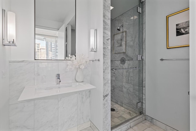 bathroom with a shower with shower door