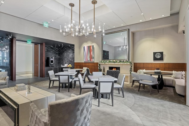 dining space featuring wooden walls