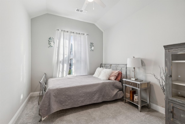 carpeted bedroom with lofted ceiling and ceiling fan