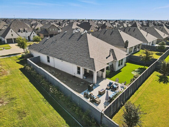 view of front of house featuring a garage and a front lawn