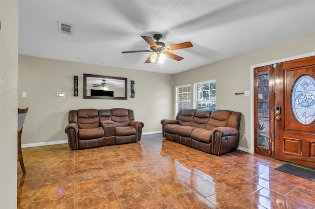 living room with ceiling fan