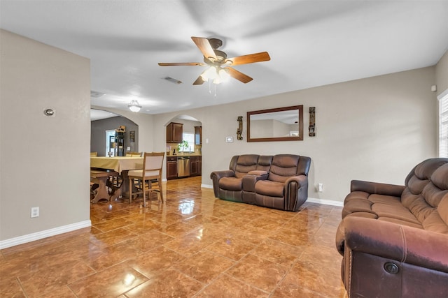 living room featuring ceiling fan