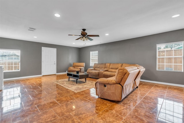 living room featuring ceiling fan