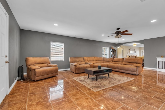 living room with ceiling fan