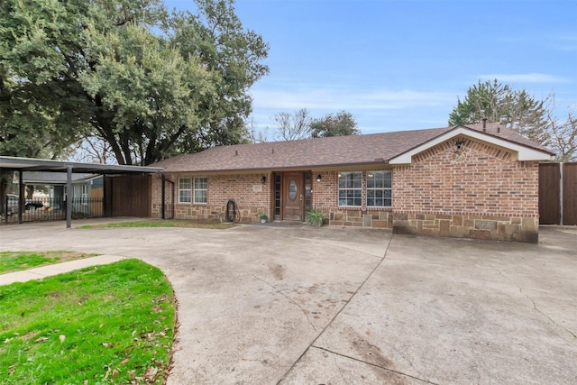 single story home with a carport